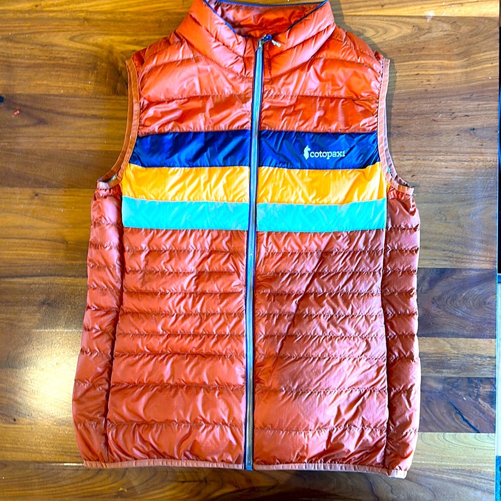 Cotopaxi Fuego Down Vest— burnt orange with vintage inspired stripes